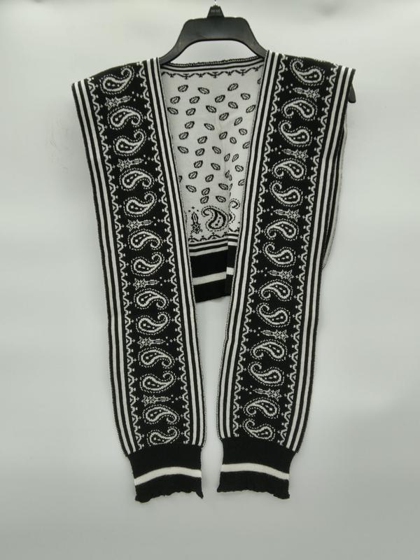 Cardigan vest smanicato a maglia con stampa paisley bianco e nero, bordi a righe, vestibilità open-front. Capo in maglia jacquard dal design grafico elegante, ideale per look casual-chic. Disponibile all'ingrosso per boutique e rivenditori di moda do