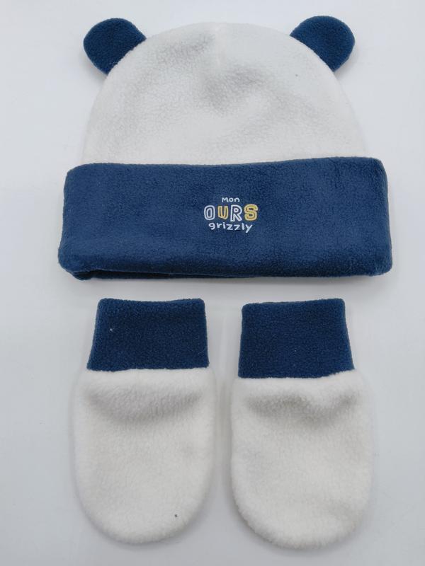 Set cappellino e muffole neonato in pile bianco e blu navy con orecchie da orso, collezione Mon Ours Grizzly. Accessori invernali bambino morbidi e caldi, ideali per completare l'outfit neonato. Cappellino con orecchie orsetto abbinato a guantini coo