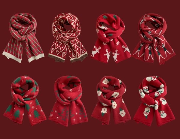 Set di 8 sciarpe natalizie lavorate a maglia in rosso con fantasie holiday: renne, pupazzi di neve, Babbo Natale e fiocchi di neve. Accessori invernali all'ingrosso in maglia jacquard, perfetti per il Natale. Collezione wholesale di sciarpe rosse in